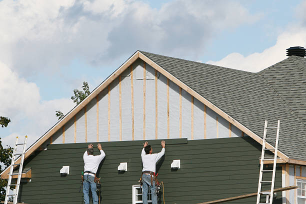 Professional Siding Replacement technician working in Cocoa Beach, FL